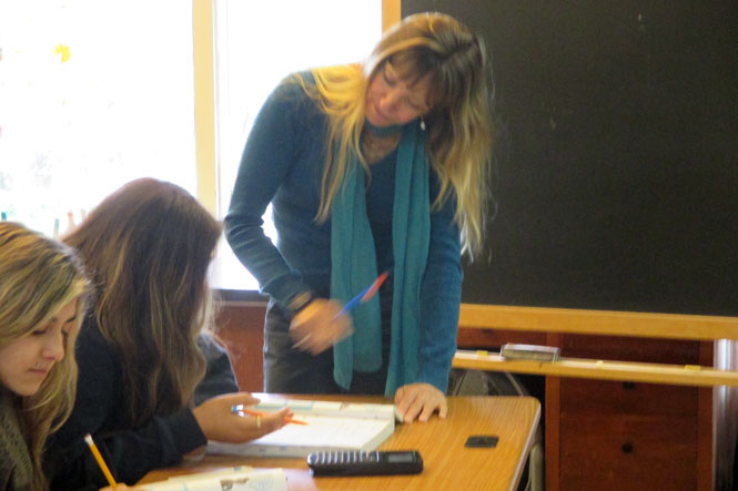 Teacher working with a student